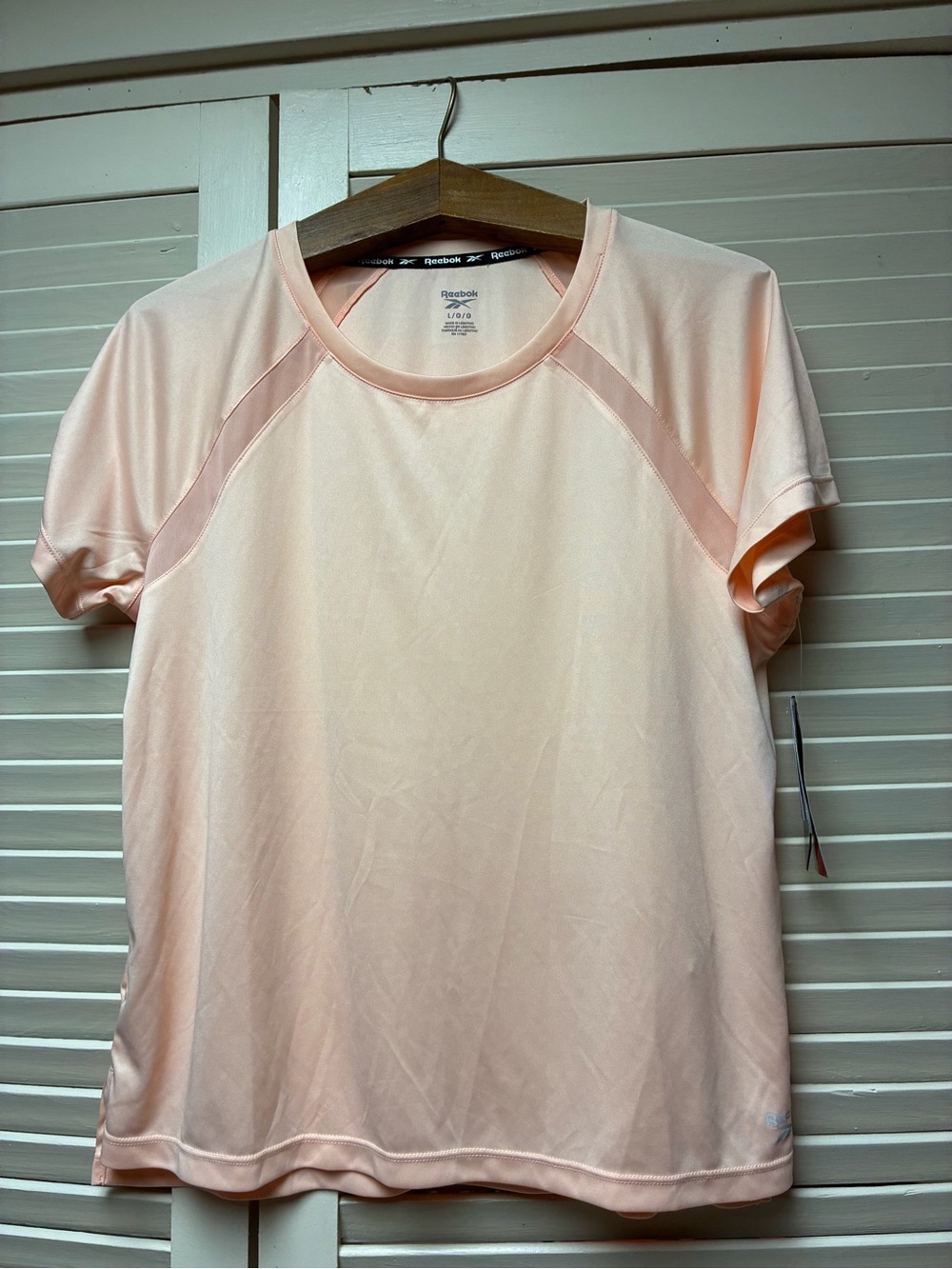 Reebok Woman’s Peach Athletic Short-Sleeve Shirt